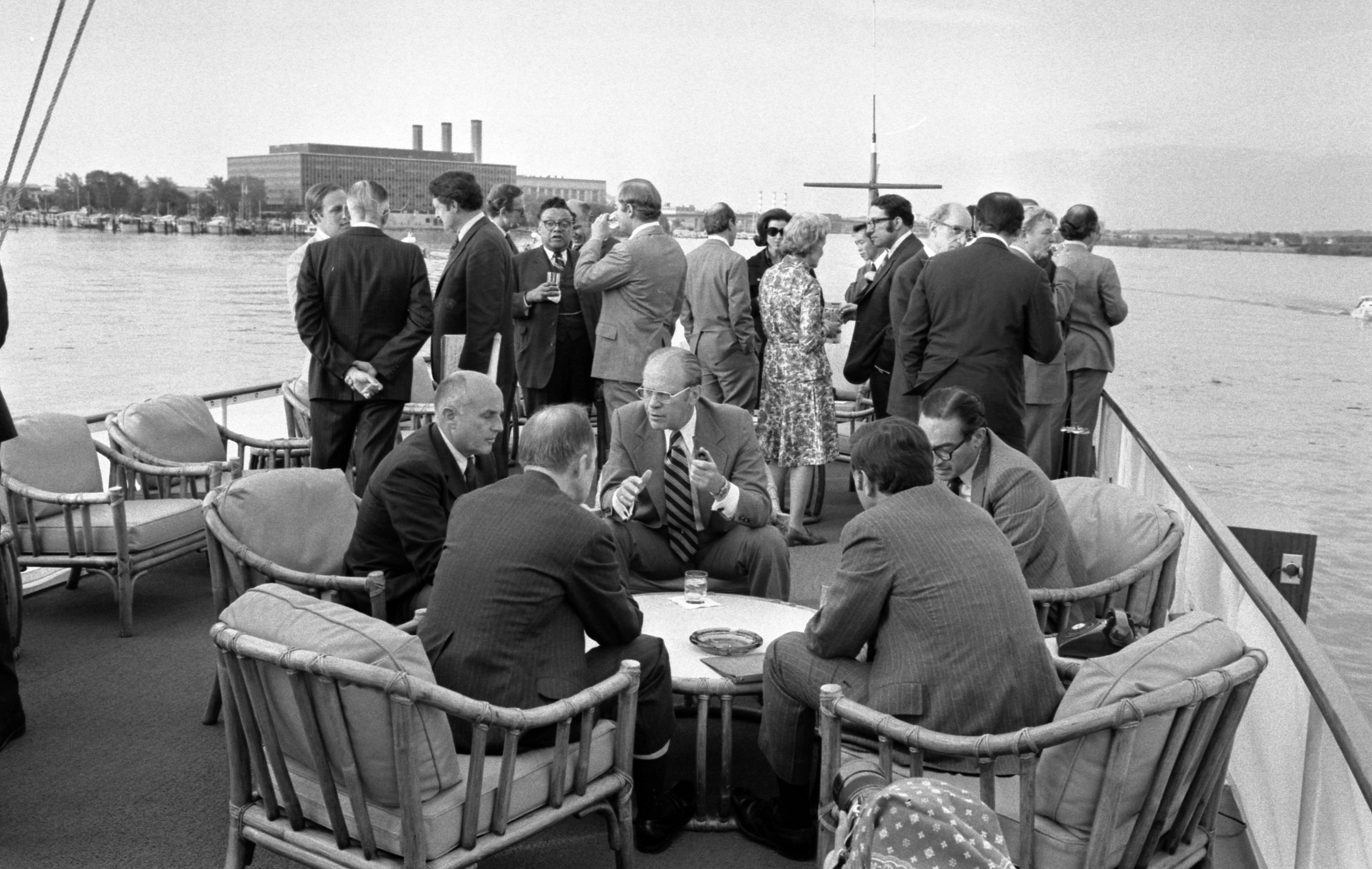 President Gerald Ford hosts an informal dinner and a Cabinet meeting aboard the presidential yacht USS Sequoia on the Potomac River, 7 May 1975.